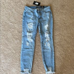 Light Wash Distressed Jeans from FashionNova